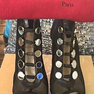 Black Christian Louboutin red bottom.Size 39.5
